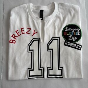 White Graphic Tee with Red and Black Accents